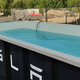 Image for article titled Tesla Wants You To Sit in a Wet Dumpster While Your Car Charges